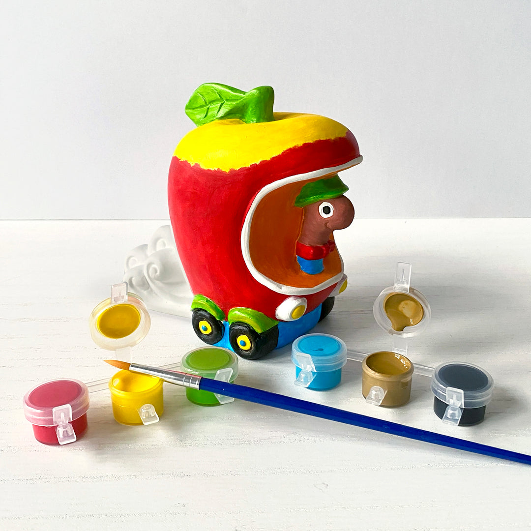 Richard Scarry's Busy World® Paint A Racer - Lowly – Customize Lowly Worm’s race car with paint. The car outside the box with paints.